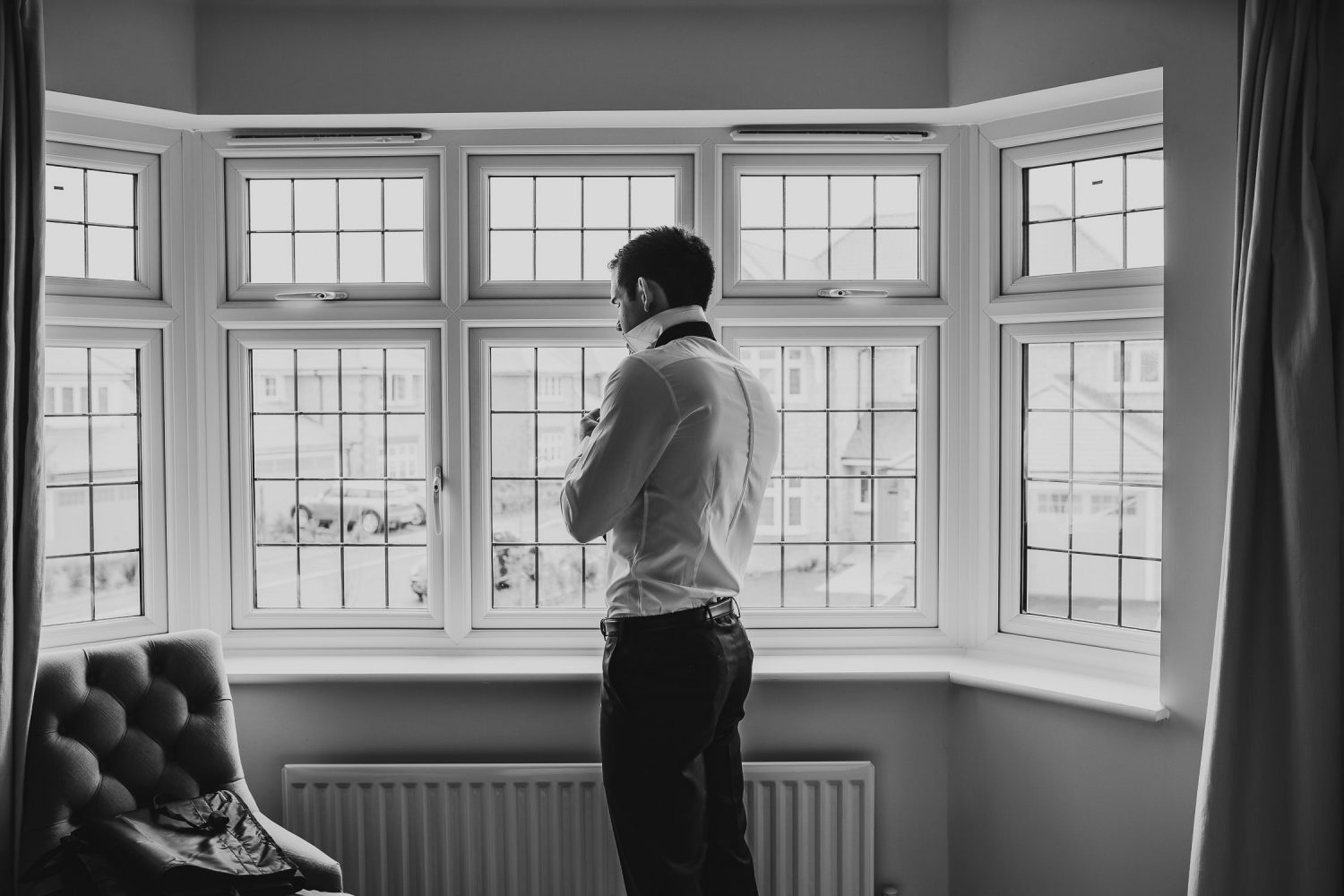 luxury manor house hotel wedding groom getting ready black and white
