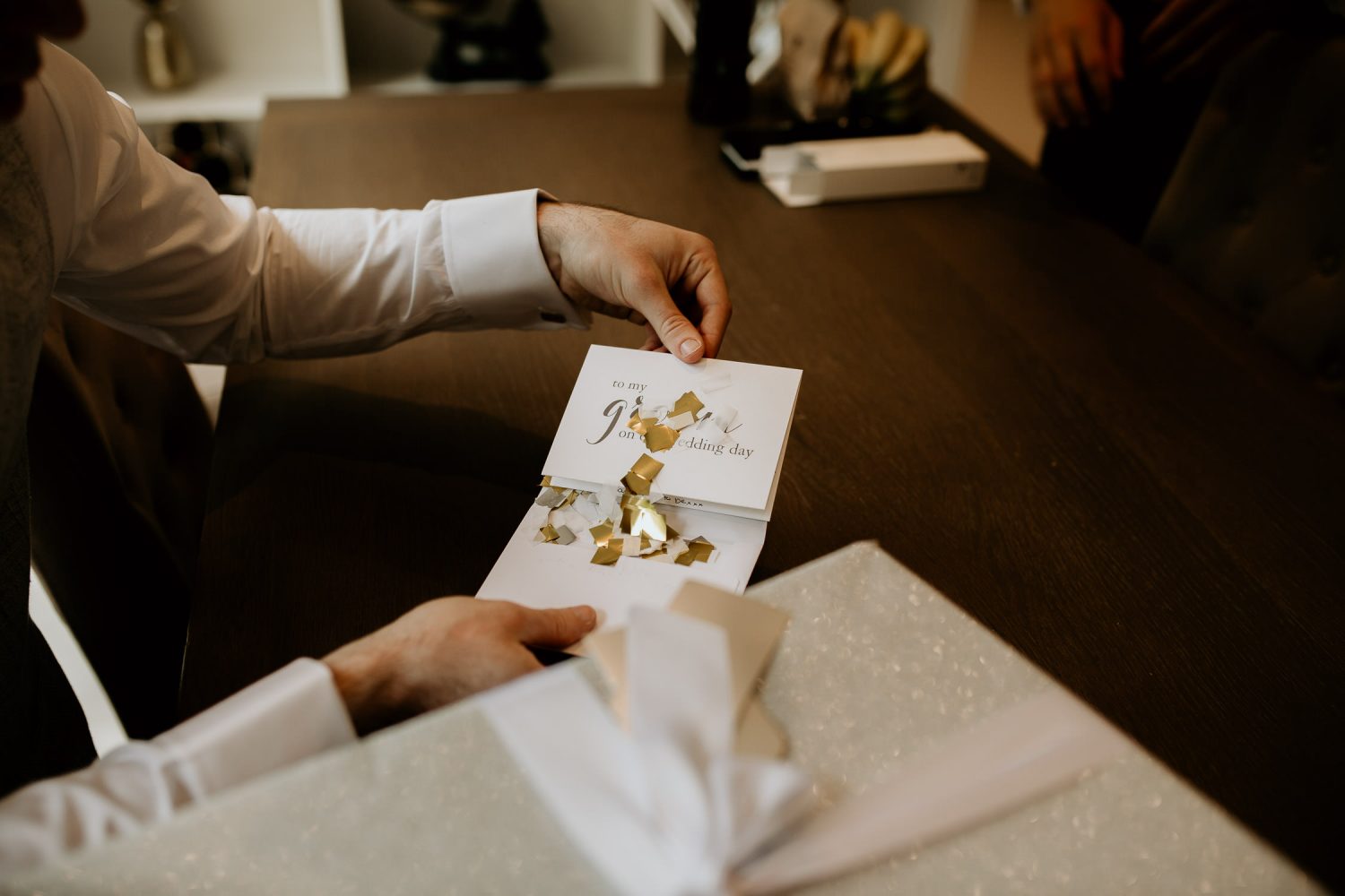 luxury manor house hotel wedding invitation with golden confetti