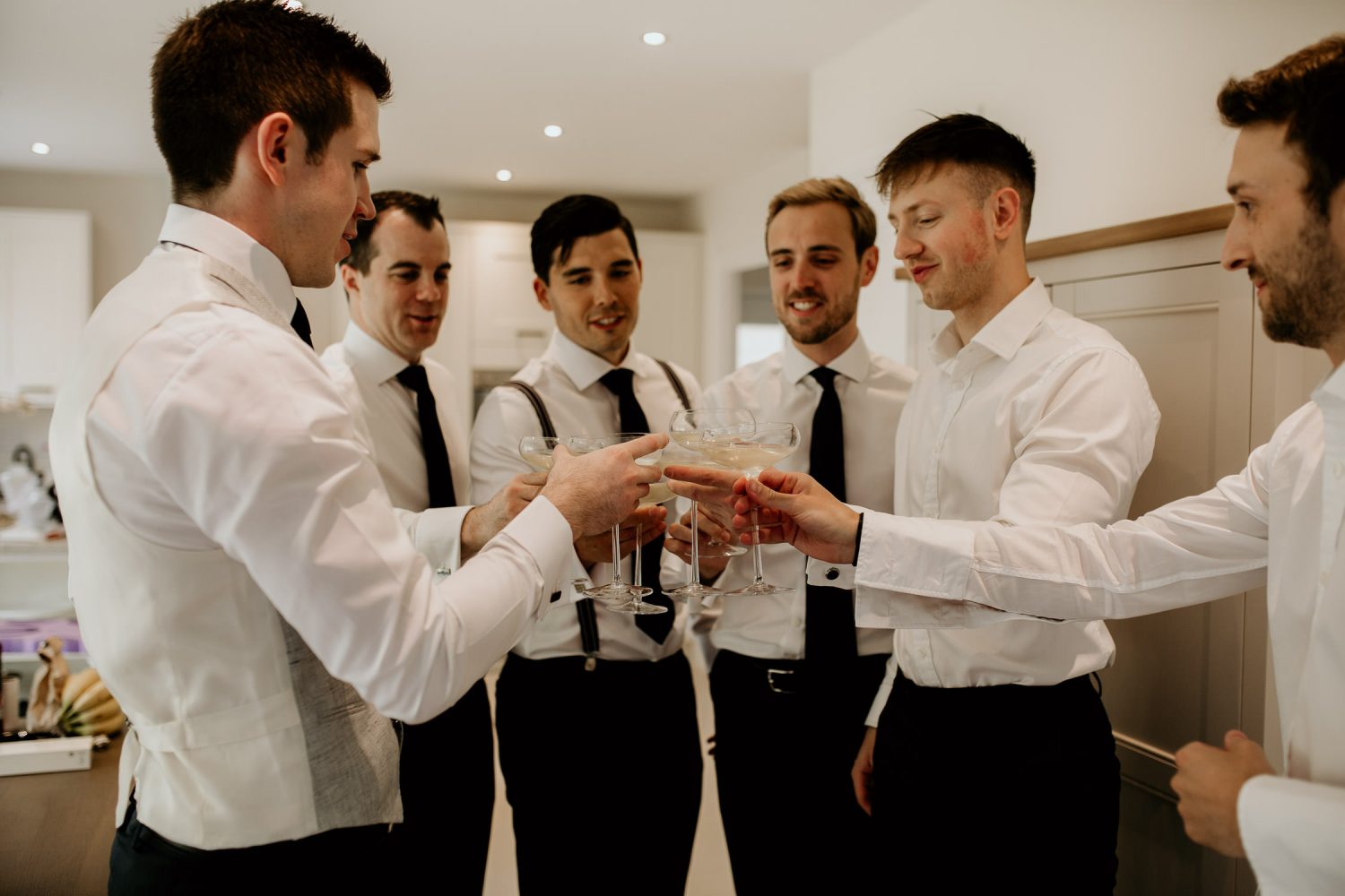 luxury manor house hotel wedding groom and groomsmen luxury drinks