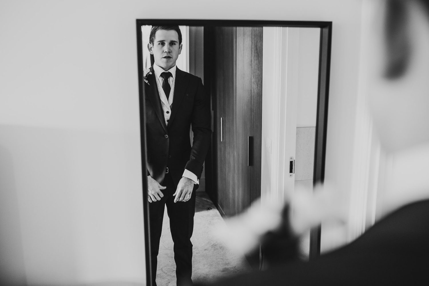 luxury manor house hotel wedding groom and grooms men getting ready black and white