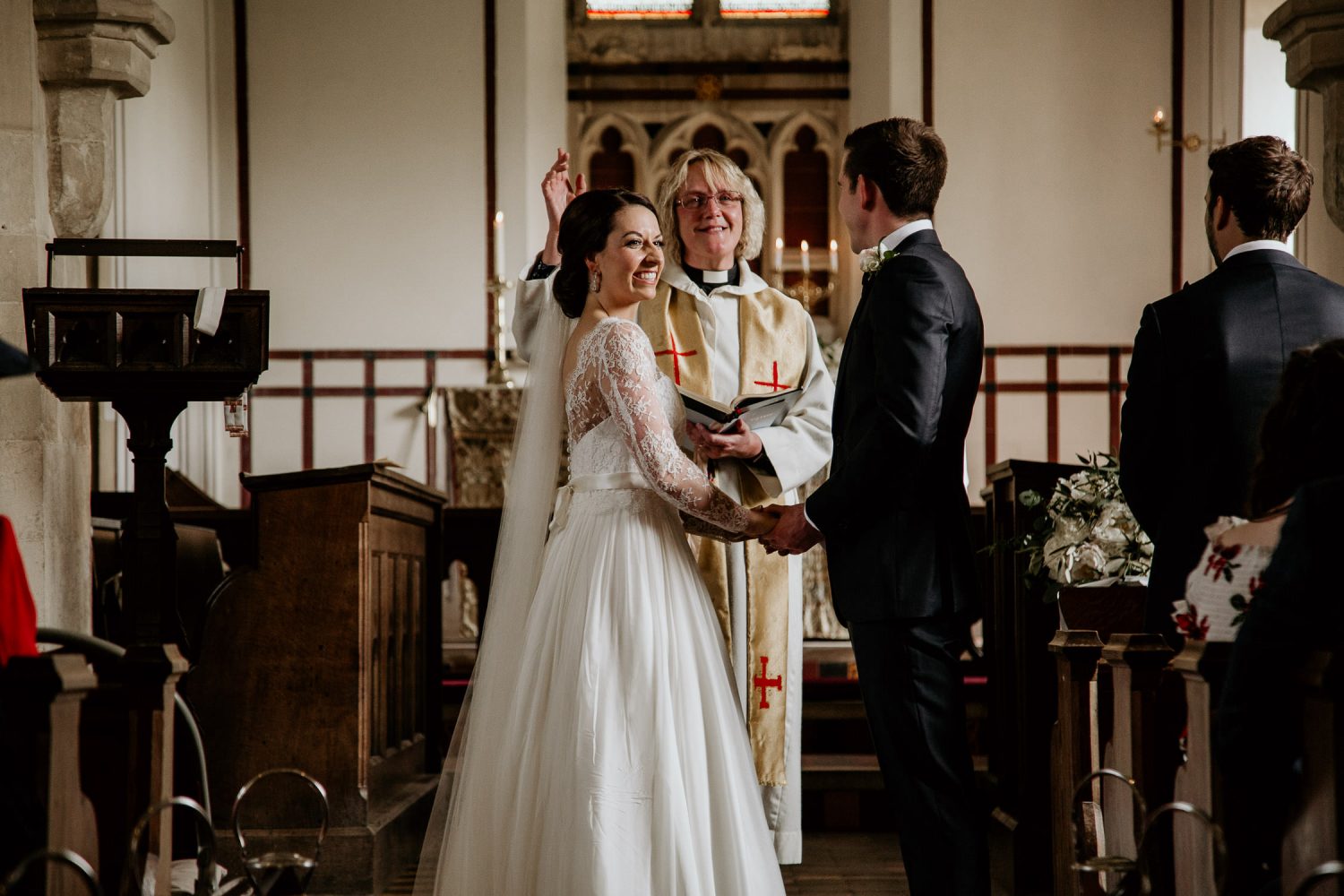 luxury manor house hotel wedding smiling bride and groom take their vows