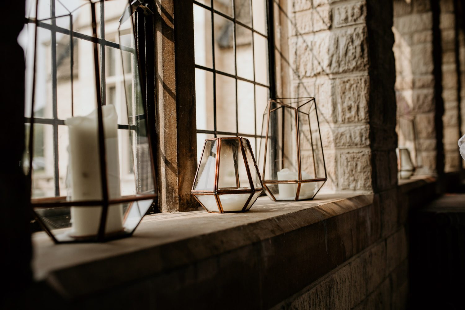 luxury manor house hotel wedding geometric candle holders on windowsill