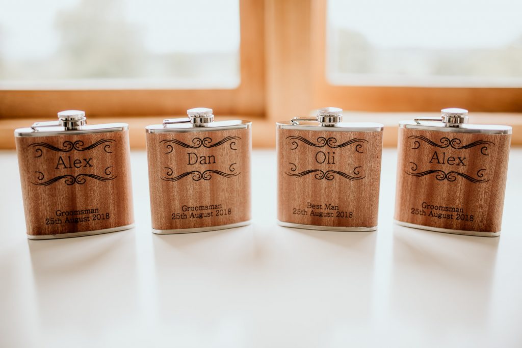 personalised wedding favours groomsman and best man gifts of personalised hip flasks