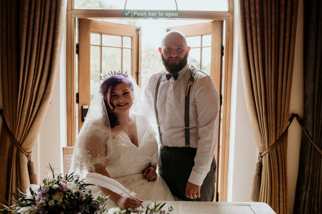 quirky and alternative bride and groom sign wedding register
