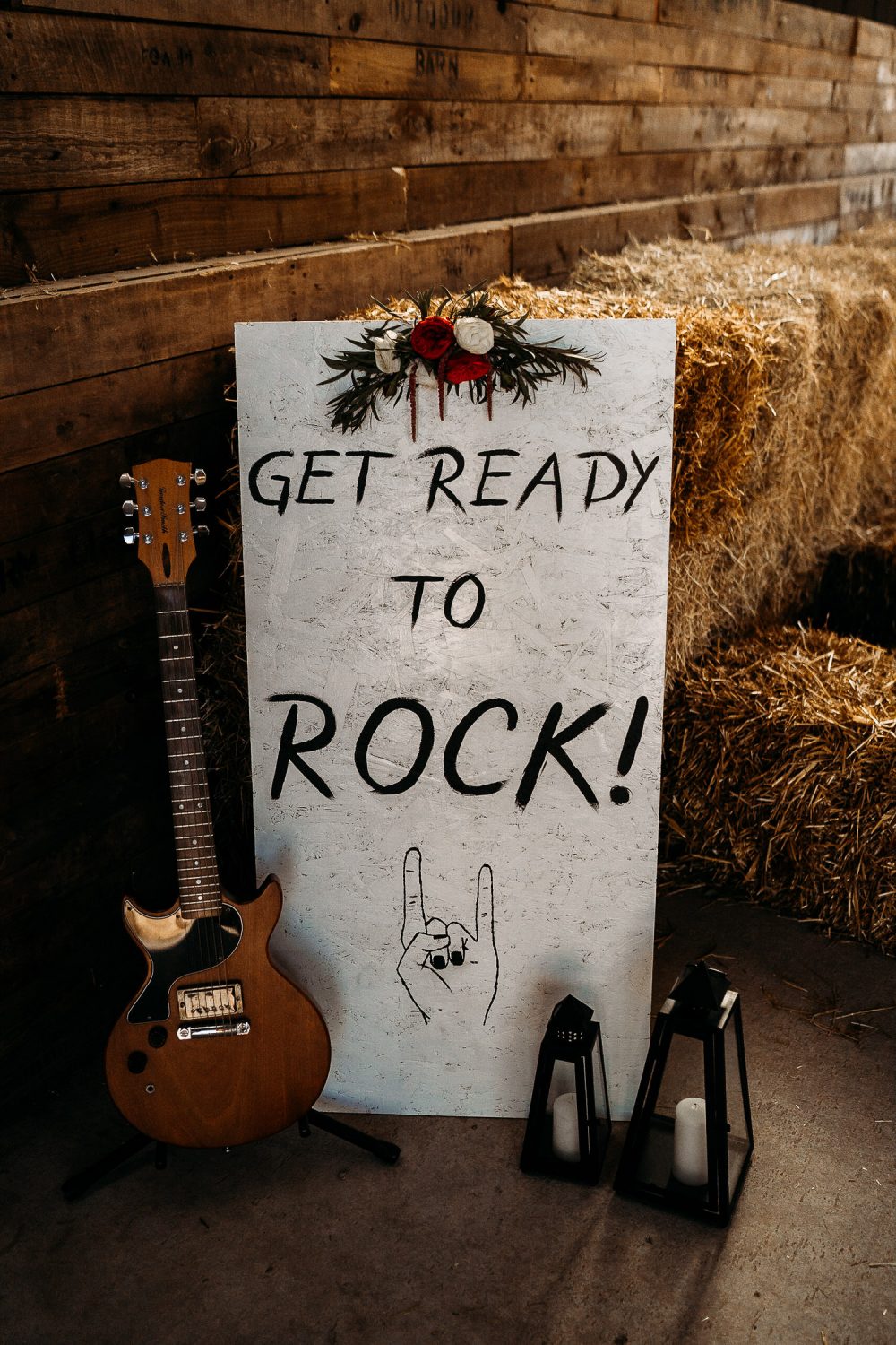 Get Ready to Rock Wedding Sign with Guitar and Hurricane Vase Decor