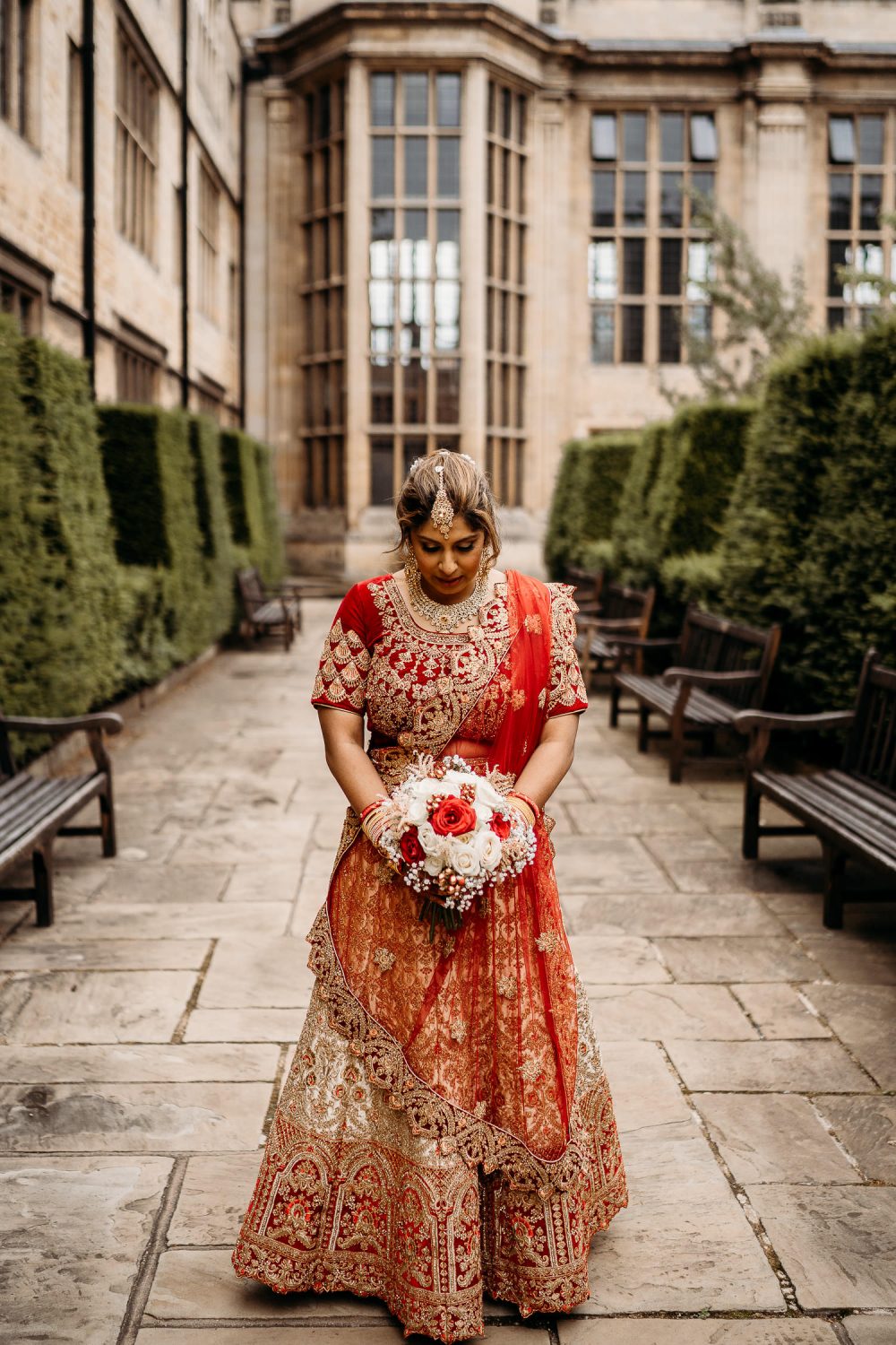 bride in red sari in uppingham chapel