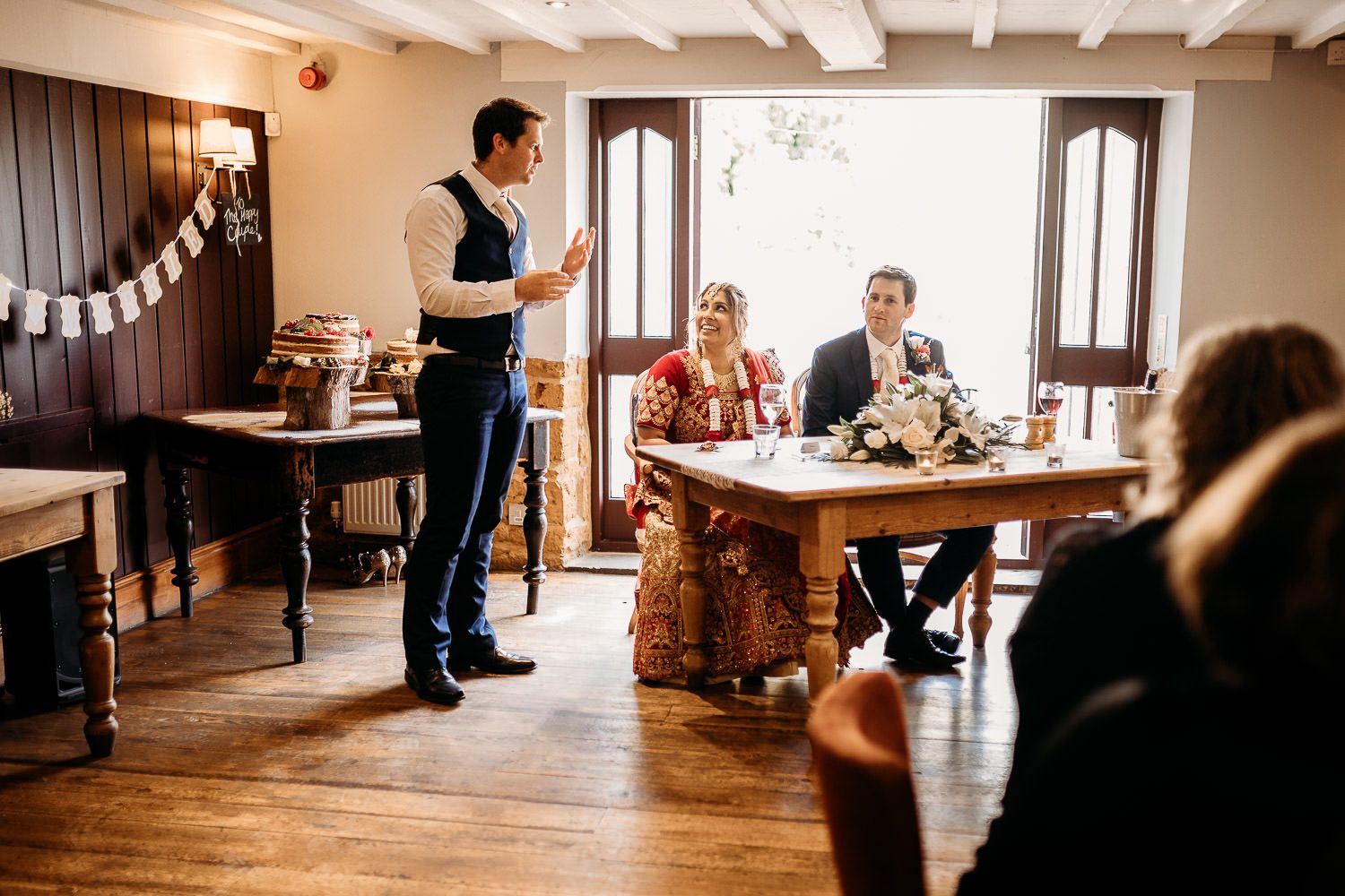 brother giving wedding speech at indian wedding