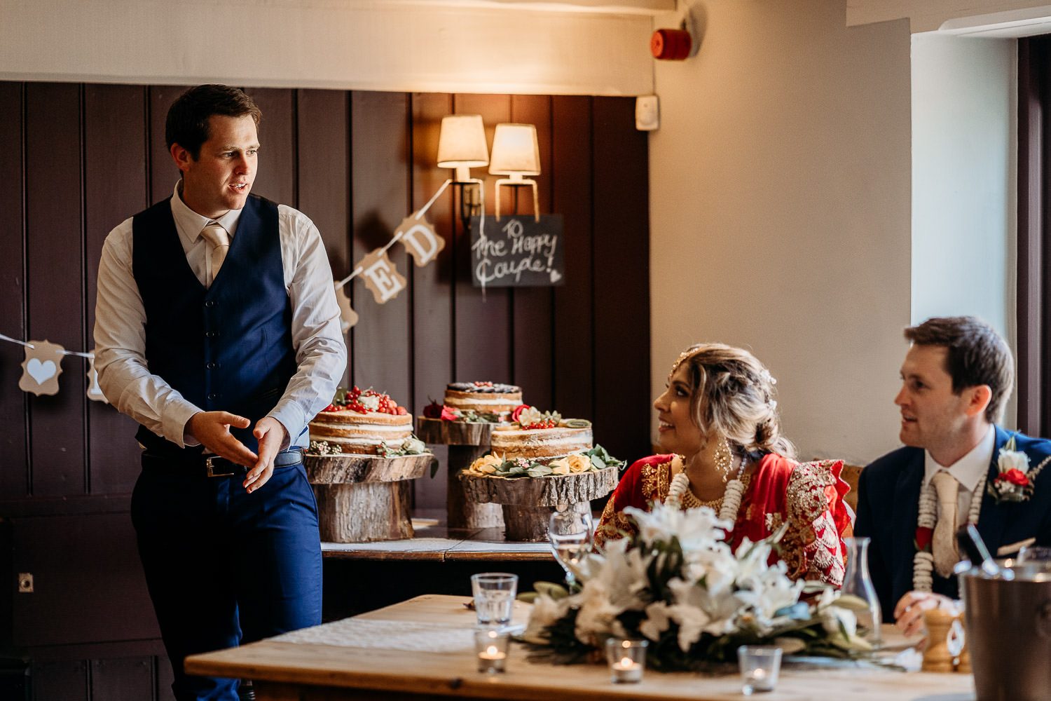 family speaking during asian wedding speeches