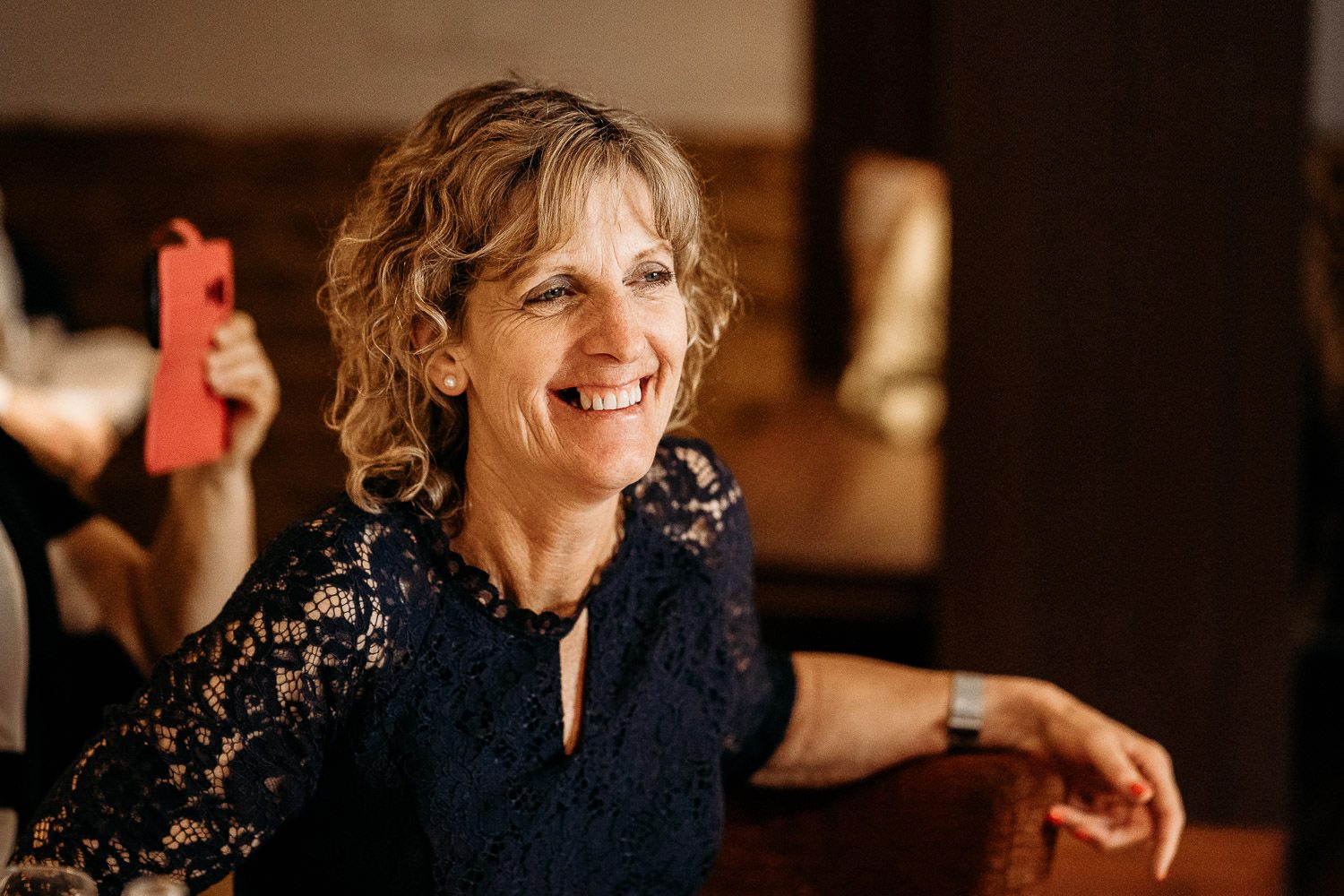 close up of groom's mum smiling