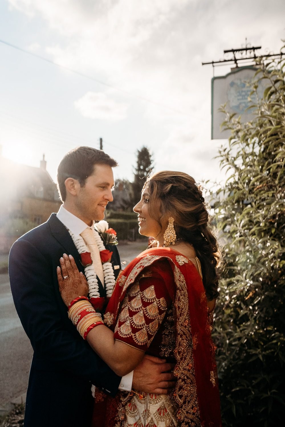 portait of indian bride and groom at sunset