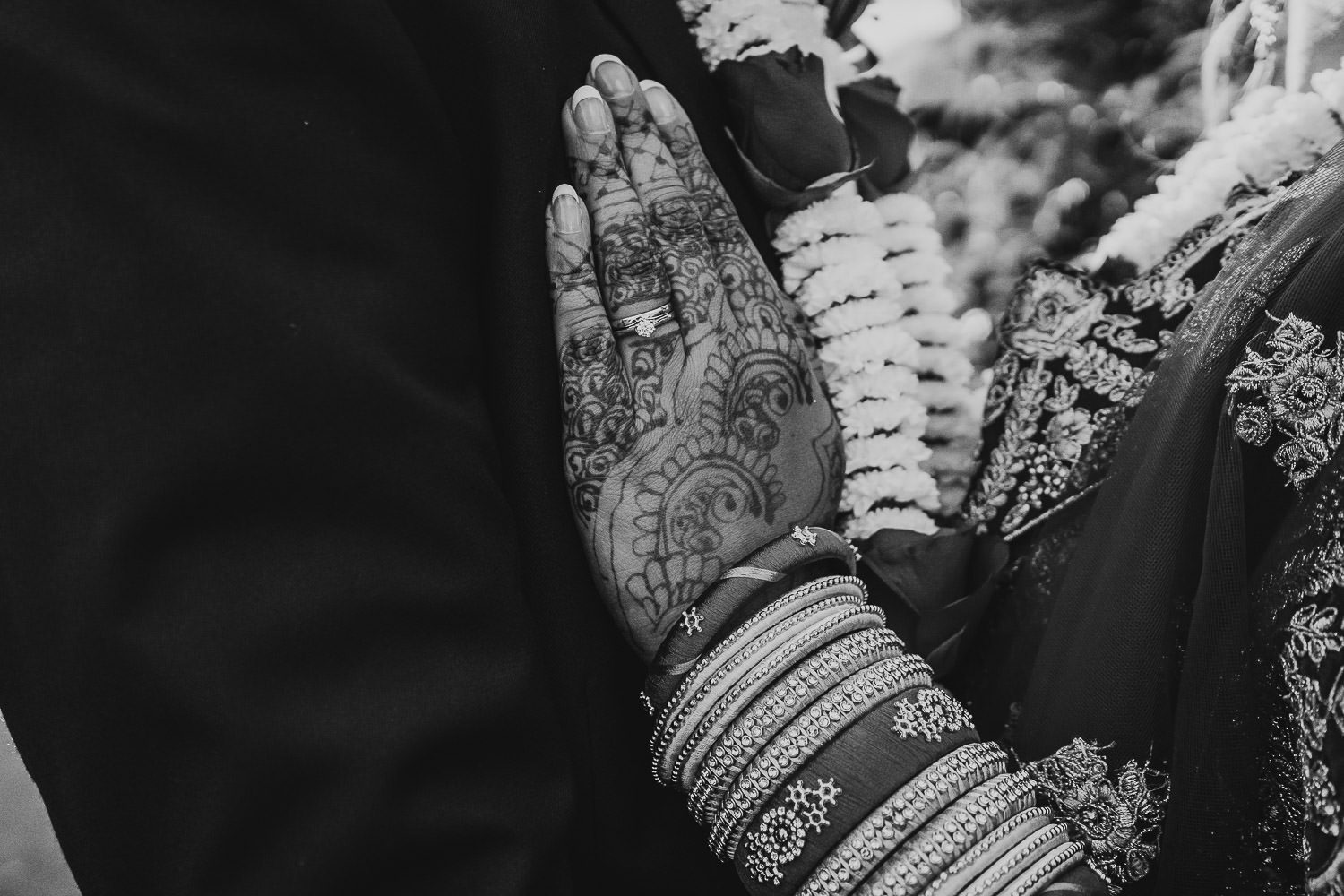 close up wededing rings on asain bride