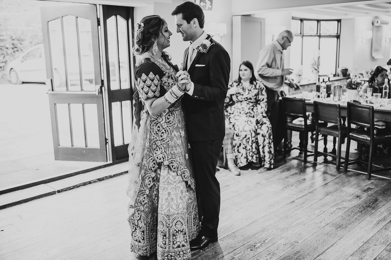 indian bride and groom dancing at weddding