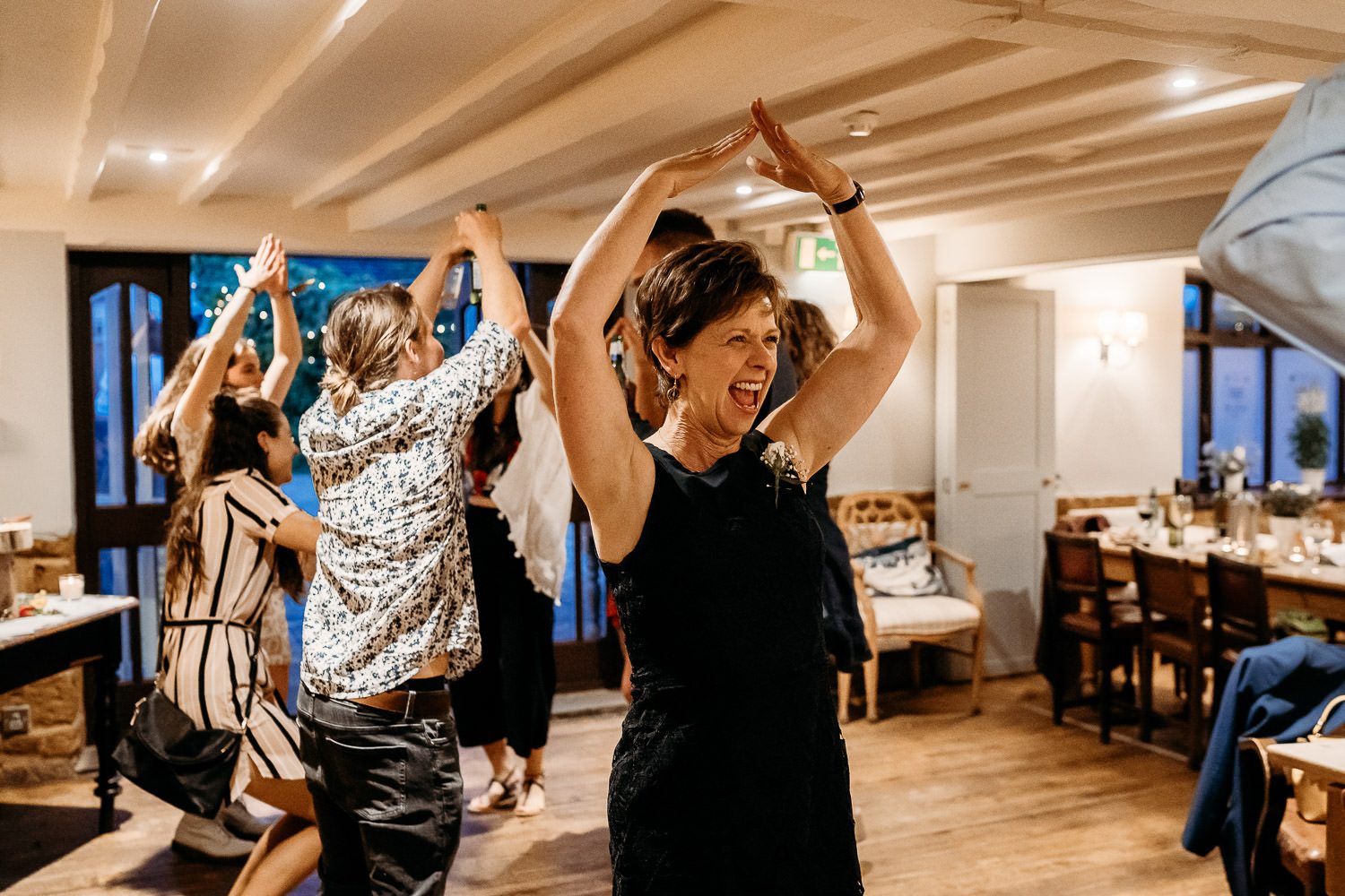 fun wedding guest dancing