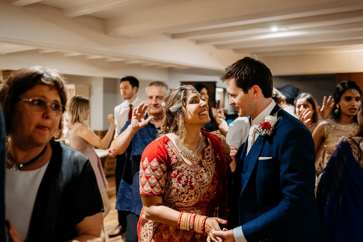 BRIDE AND GROOM DANCING DURING INDIAN WEDDING IN LEICESTER