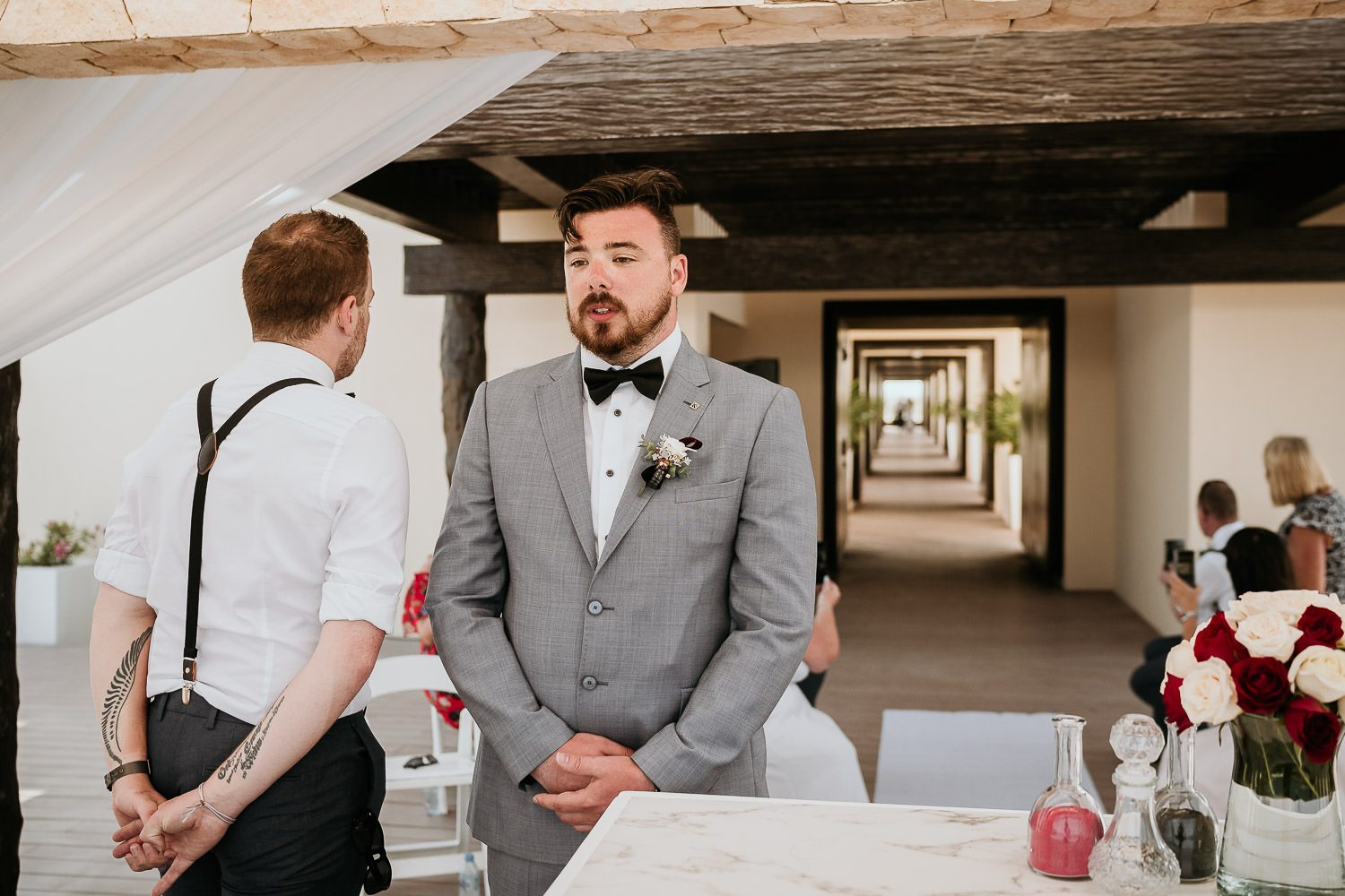 groom waiting for bride before wedding ceremony on sky terrace at royalton riviera