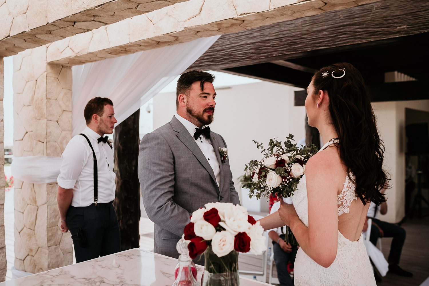 bride and groom smiling during mexican wedding ceremony