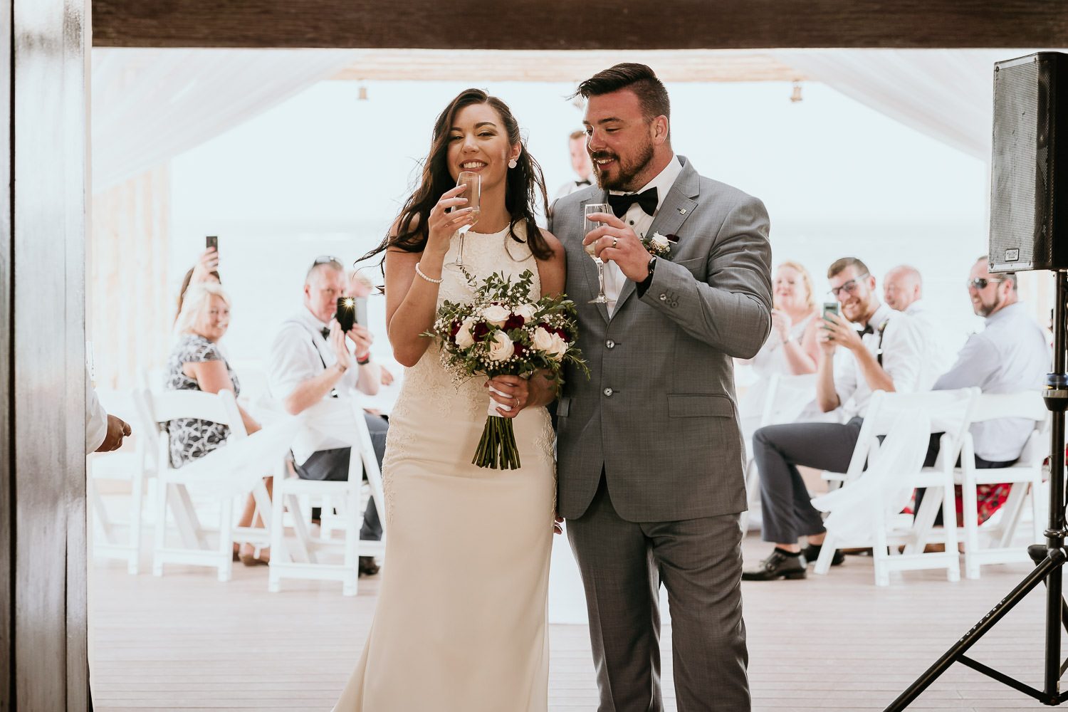 bride and groom walking down aisle together