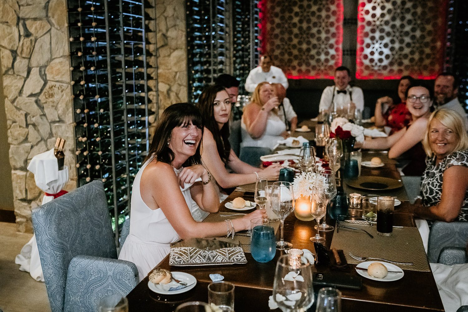 wedding guests laughing during speech in royalton riviera