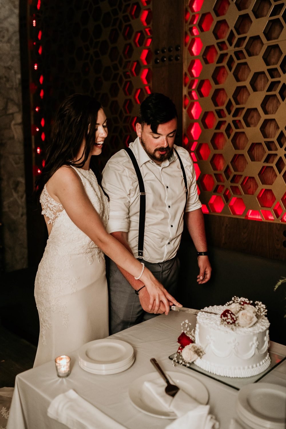 bride and groom cutting wedding cake in royalton riviera resort