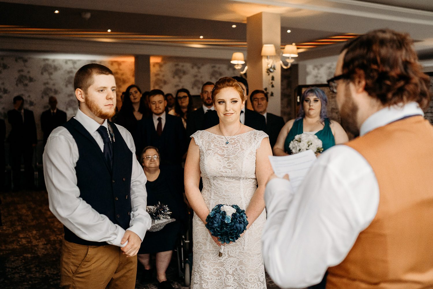 bride and groom reading wedding vows during humanist wedding ceremony
