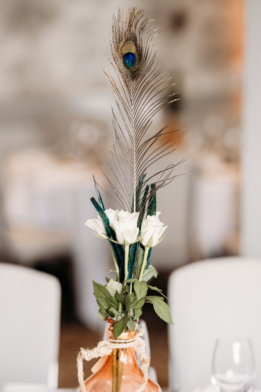 wedding decor using peacock feathers
