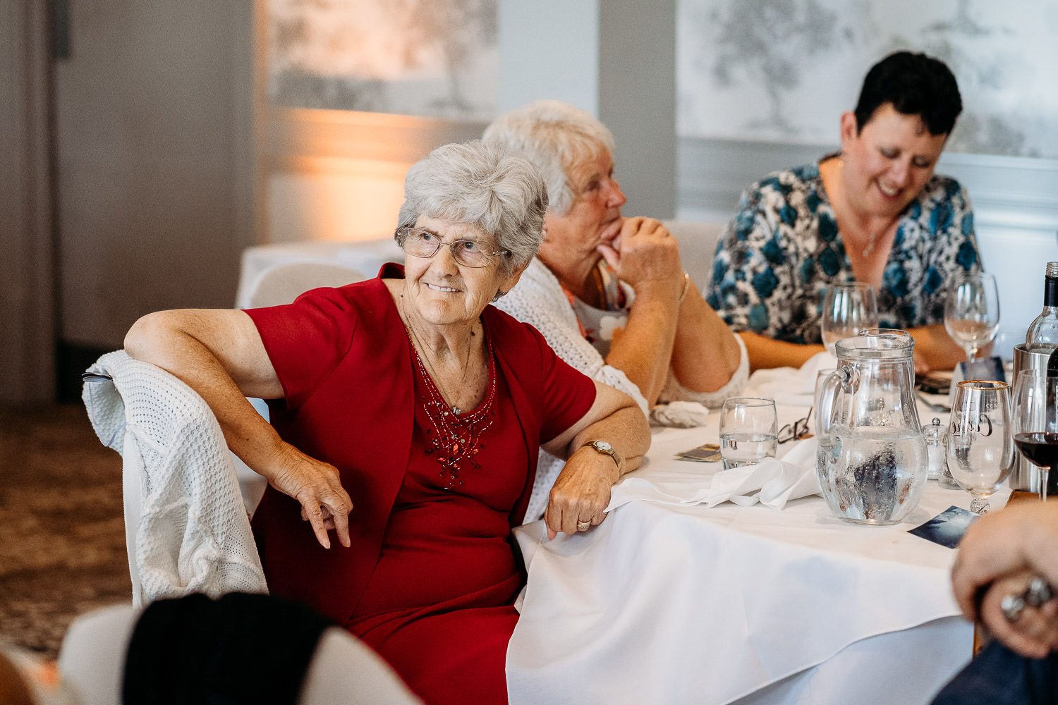 family laughing during speeches