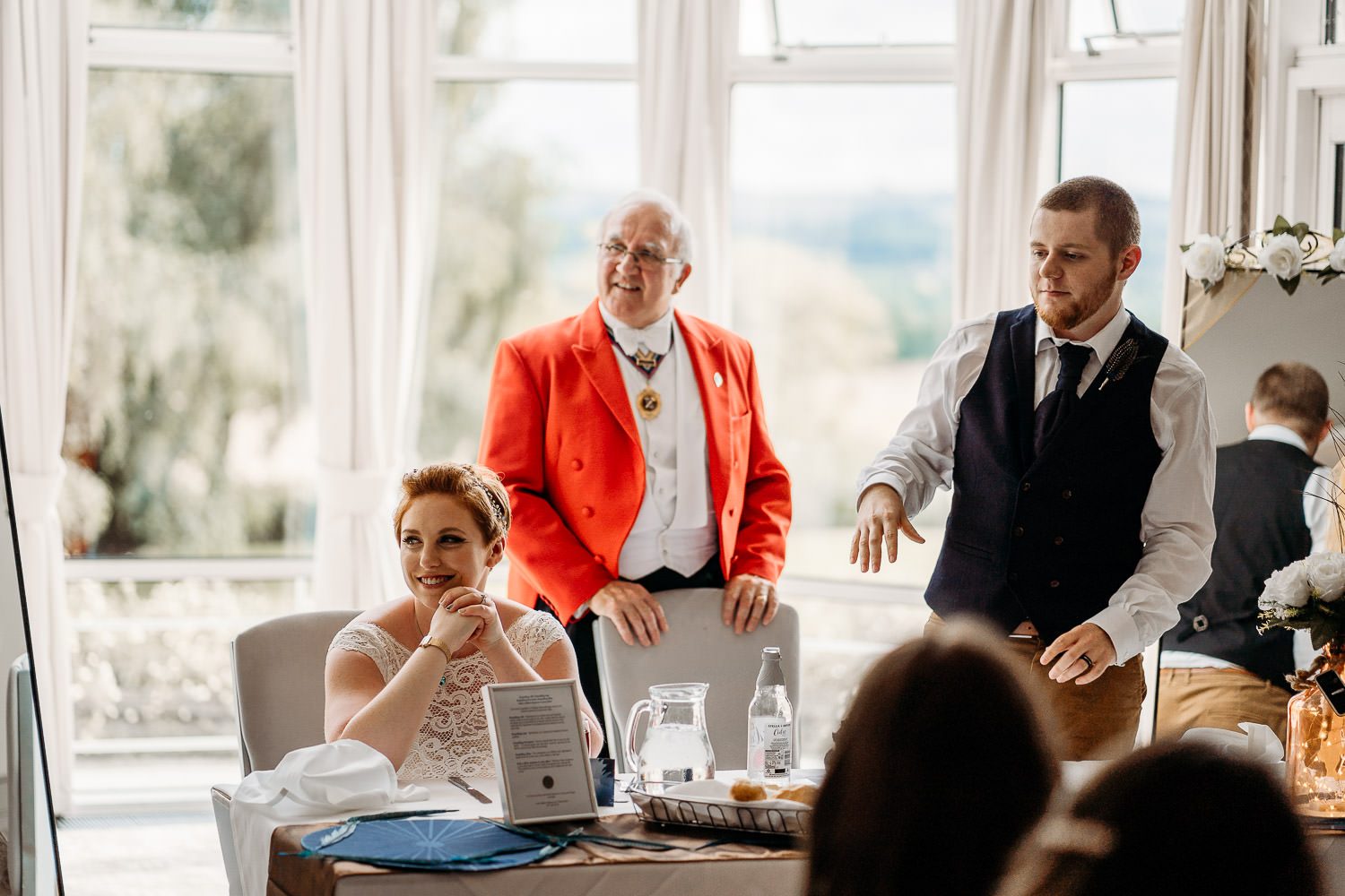 groom getting ready to give his wedding speech