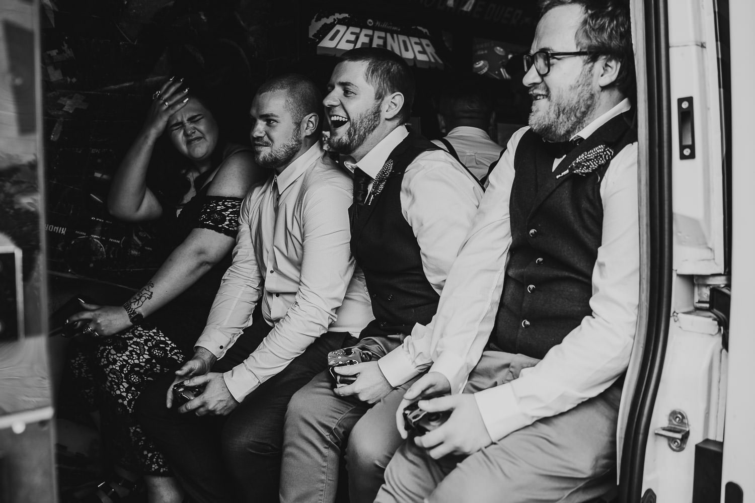 fun wedding guests laughing and playing retro video games