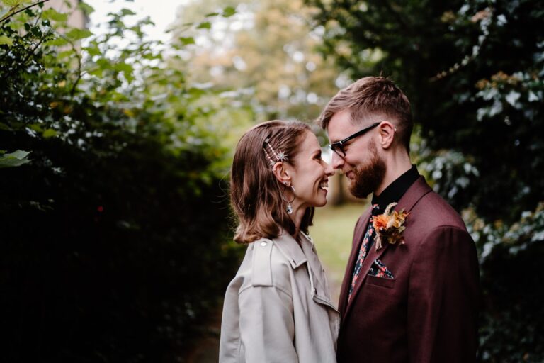 bride and groom looking into each others faces