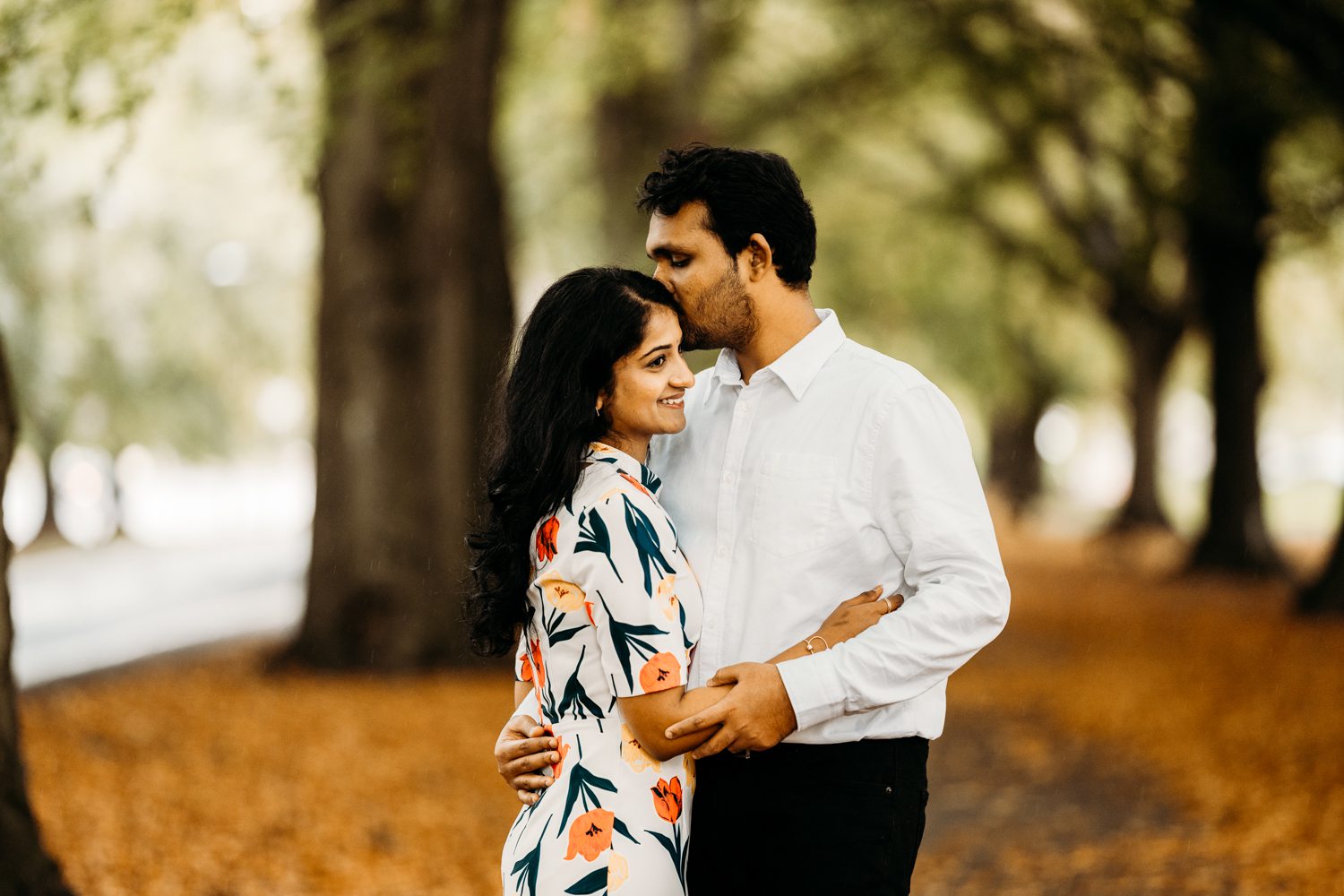 newly engaged couple embracing in bristol